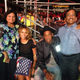 Illustration for article titled Aziz Ansari’s parents took a very cute photo with Beyoncé and Jay Z